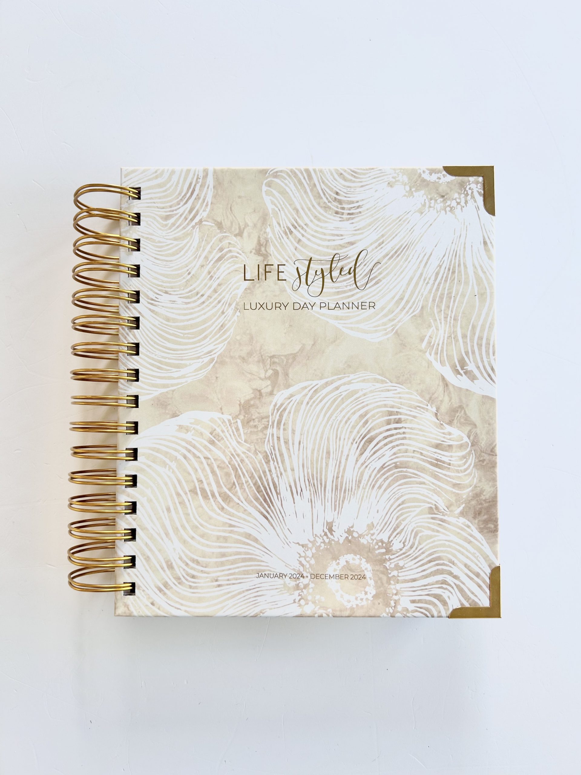 https://lifestyledplanner.com/wp-content/uploads/2021/06/2024-daily-planner-gold-scaled.jpg